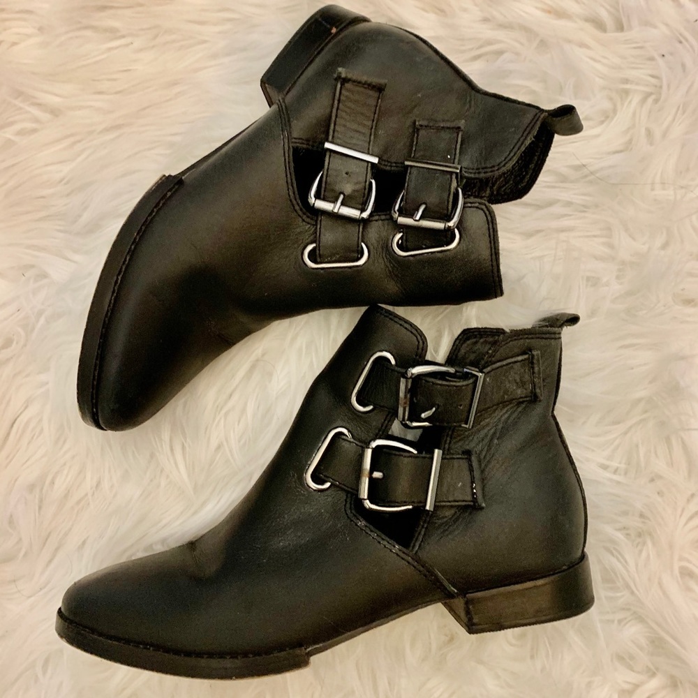 Black booties with buckles